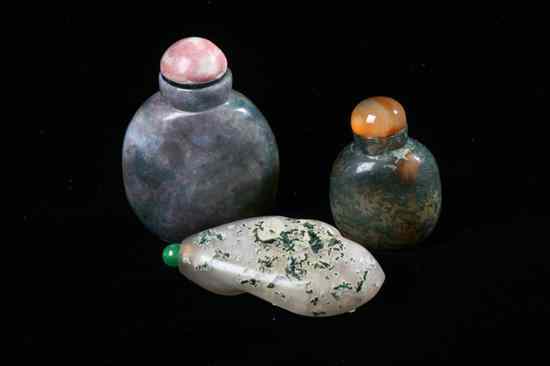 Appraisal: THREE CHINESE MOSS AGATE SNUFF BOTTLES Two flattened ovoid-form the