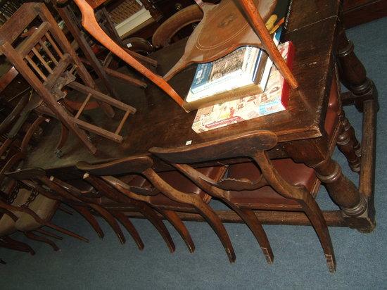 Appraisal: An antique oak and walnut refectory table with three plank