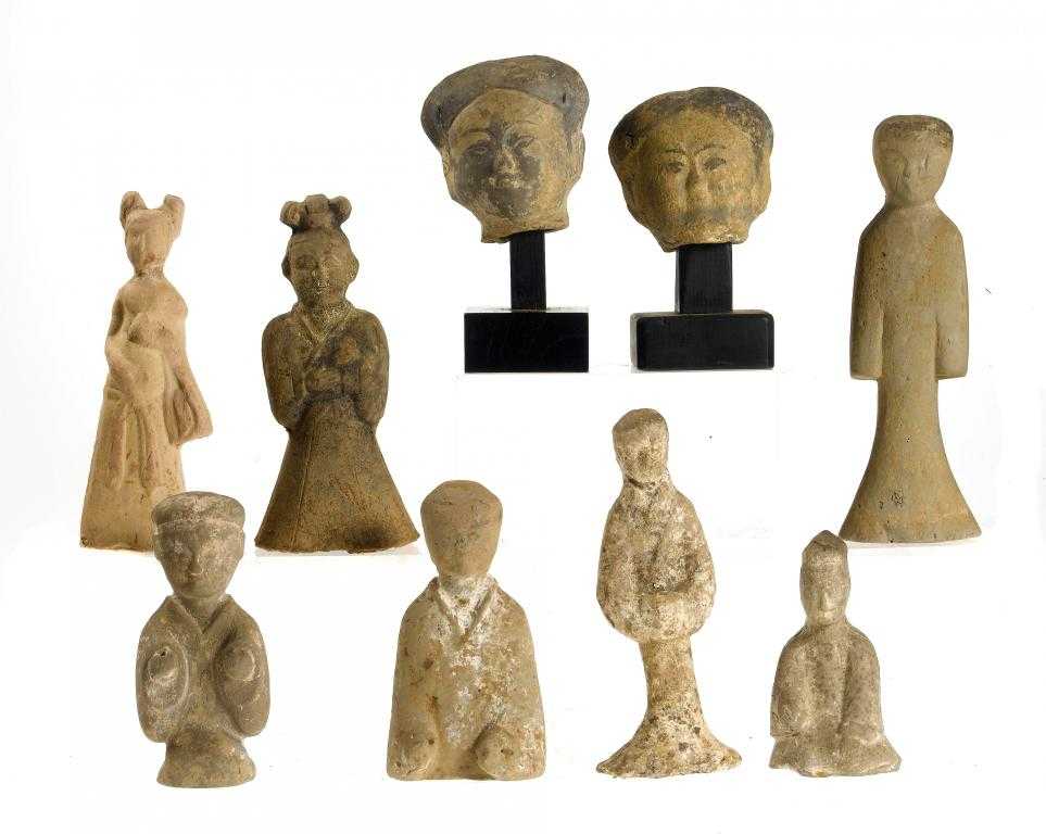 Appraisal: SEVEN EARTHENWARE FIGURES AND TWO HEADS FROM FIGURES HAN DYNASTY