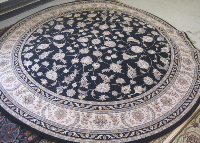 Appraisal: NEW ROUND KARASTAN CARPET Persian Renaissance Collection Black Keshan pattern