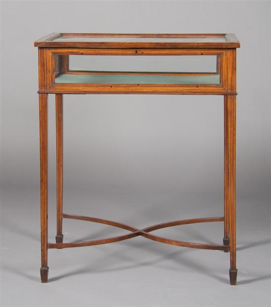 Appraisal: An English Banded Vitrine Table Height x width x depth