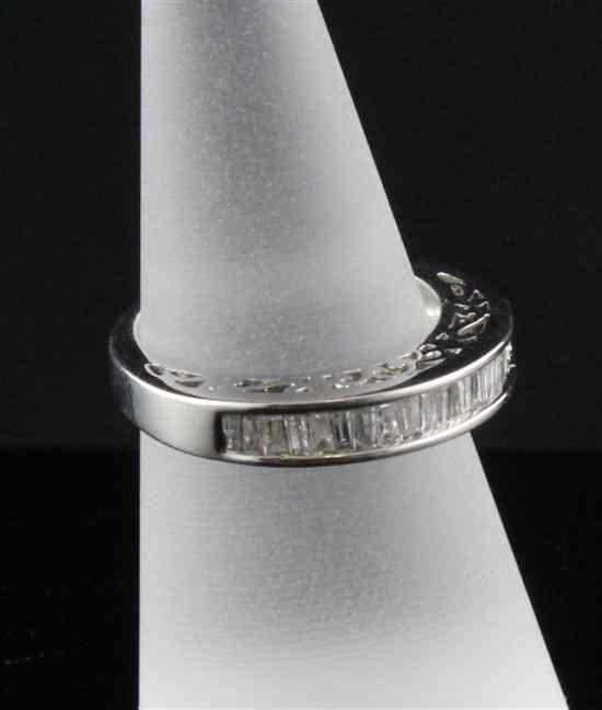 Appraisal: An ct white gold and baguette cut diamond dress ring