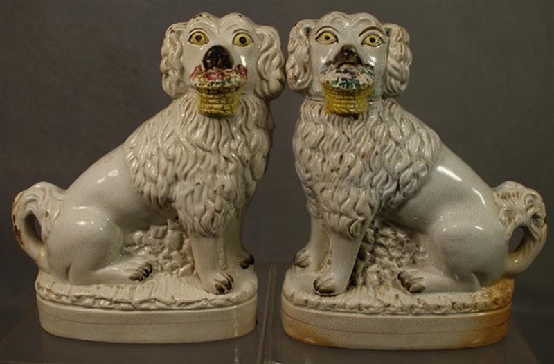 Appraisal: Pr Staffordshire white spaniels with floral baskets in mouth black