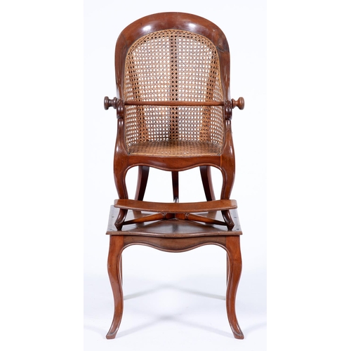 Appraisal: A Victorian mahogany and caned child's highchair and stand cm