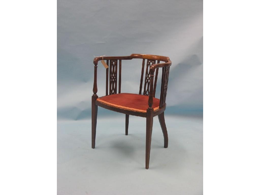 Appraisal: An Edwardian inlaid mahogany elbow chair circular back with three