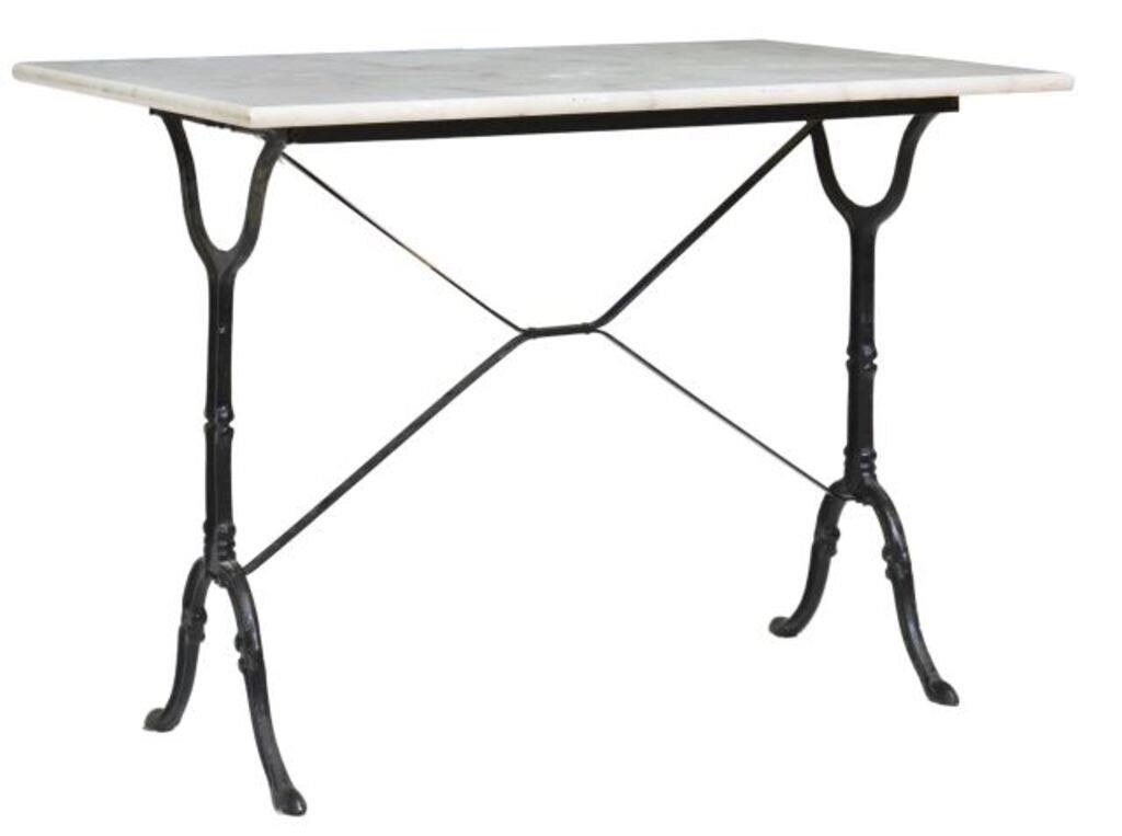 Appraisal: French cast iron bistro table th c rectangular marble top