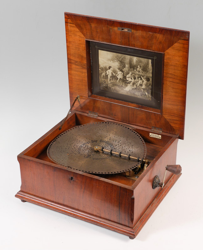 Appraisal: INLAID '' POLYPHON MUSIC BOX AND DISCS Mahogany veneer case