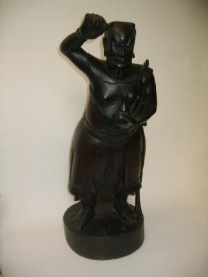 Appraisal: A JAPANESE CARVED HOLLOW WOOD FIGURE early th century depicting