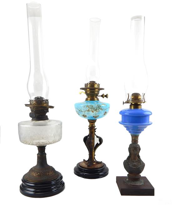 Appraisal: Three th C composite fluid table lamps including figural first