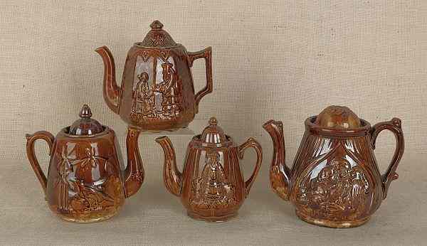 Appraisal: Four Rockingham glaze teapots th c tallest -