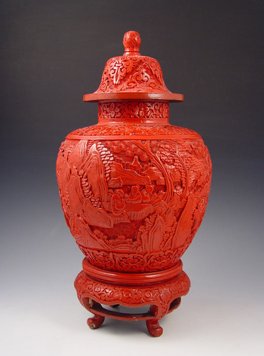 Appraisal: CHINESE CINNABAR COVERED URN ON STAND Measures '' h x