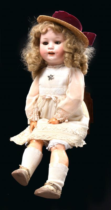 Appraisal: A GROUP OF TWO BISQUE HEAD CHARACTER DOLLS including a