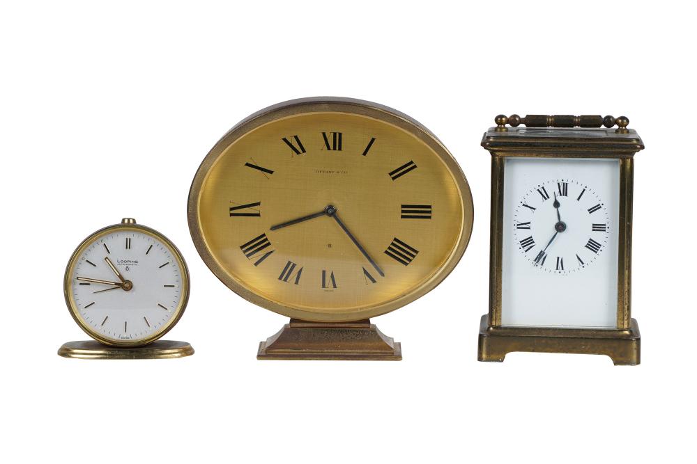 Appraisal: THREE ASSORTED DESK CLOCKScomprising one oval Tiffany Co desk clock