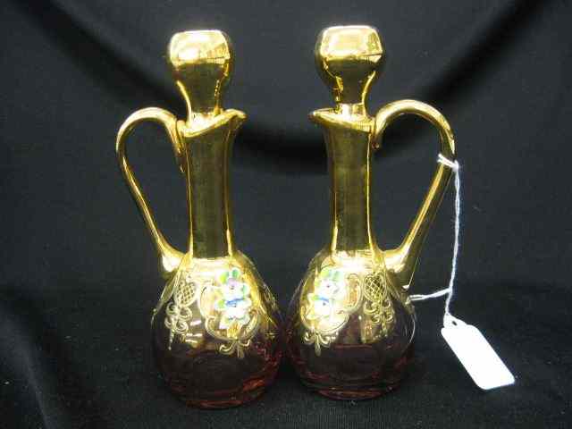 Appraisal: Pair of Italian Art Glass Cruets enameled floral gold on