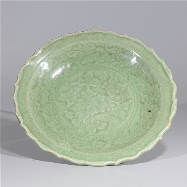 Appraisal: Chinese celadon glazed ceramic dish with incised floral and foliate