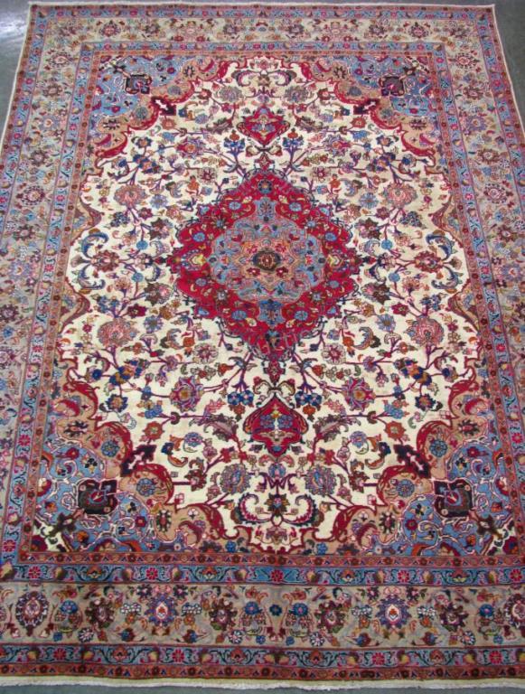 Appraisal: Handmade Antique Oriental Room Size Rug Mashad design ivory field