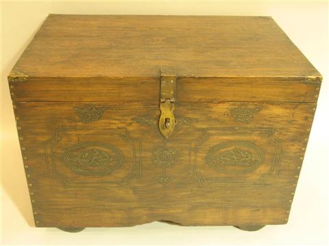 Appraisal: PROVINCIAL CARVED WOODEN TRUNK Of rectangular form the sides carved