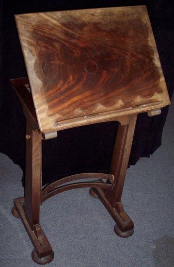 Appraisal: A mid th Century mahogany reading table the hinged top