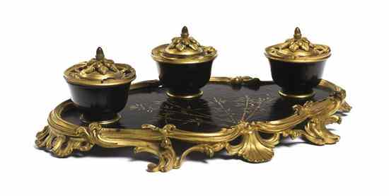 Appraisal: A French Gilt Bronze Standish having three covered bowls over