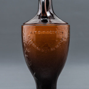 Appraisal: A New York Mold-Blown Amber Bottle American Circa - embossed