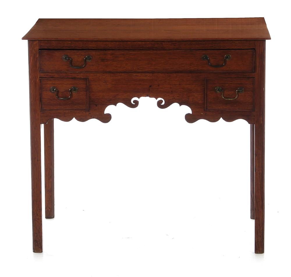 Appraisal: George III oak lowboy early th century configuration of drawers