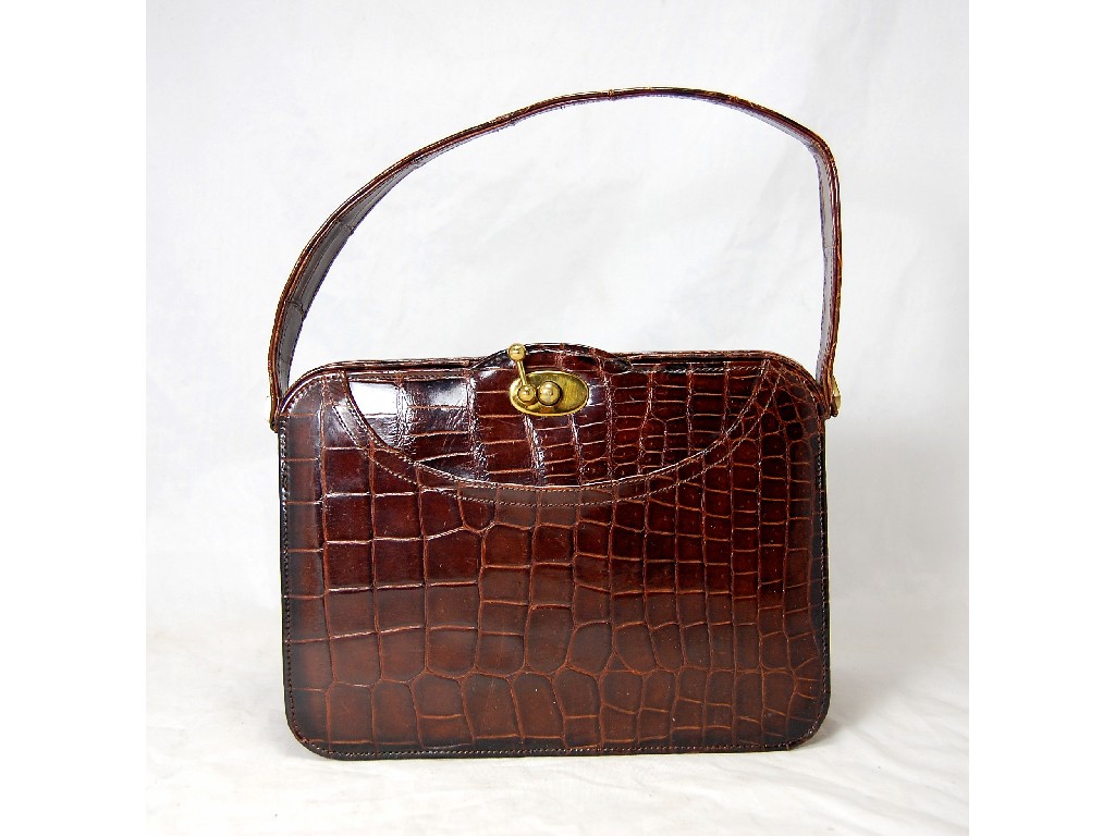 Appraisal: A small brown crocodile skin vintage handbag