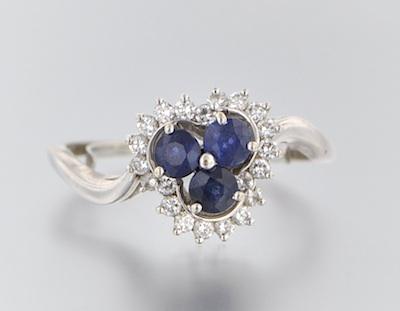 Appraisal: A Ladies' Sapphire and Diamond Cluster Ring k white gold