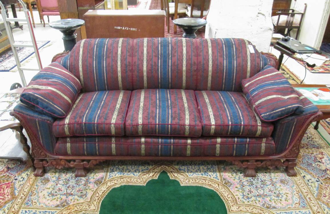 Appraisal: CARVED AND UPHOLSTERED MAHOGANY SOFA American th century L