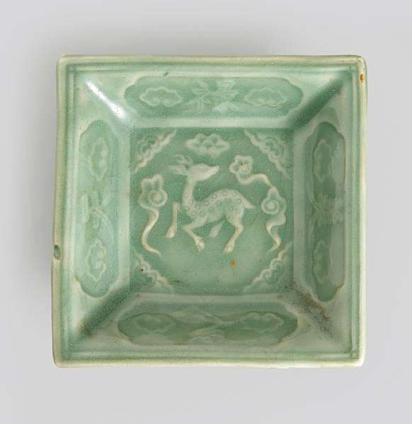 Appraisal: A small celadon glazed porcelain square dish Molded in the