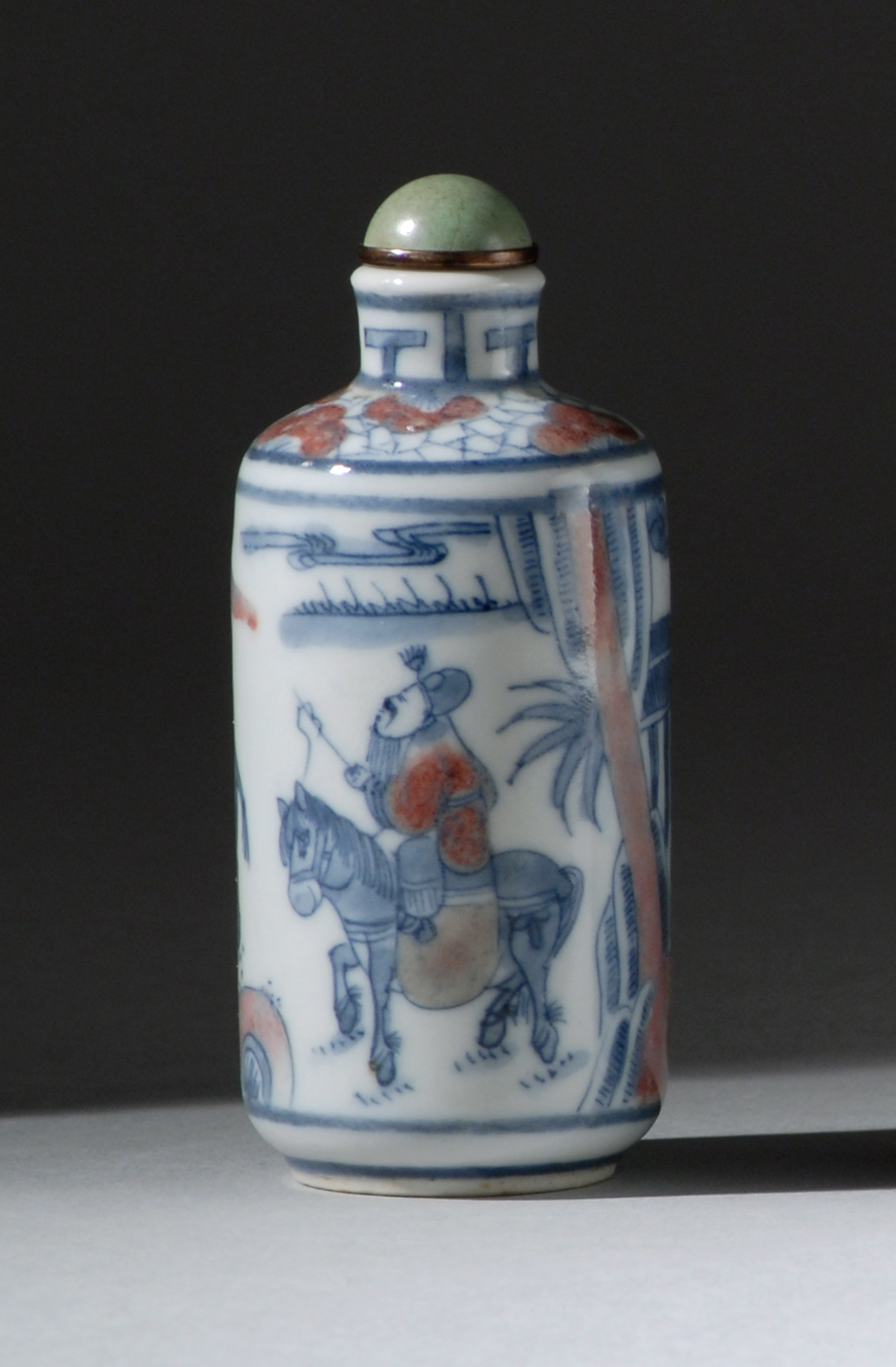 Appraisal: UNDERGLAZE RED AND BLUE PORCELAIN SNUFF BOTTLE th CenturyIn cylinder