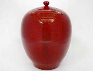 Appraisal: SANG DE BOUF GLAZED PORCELAIN JAR AND COVER Chinese Of