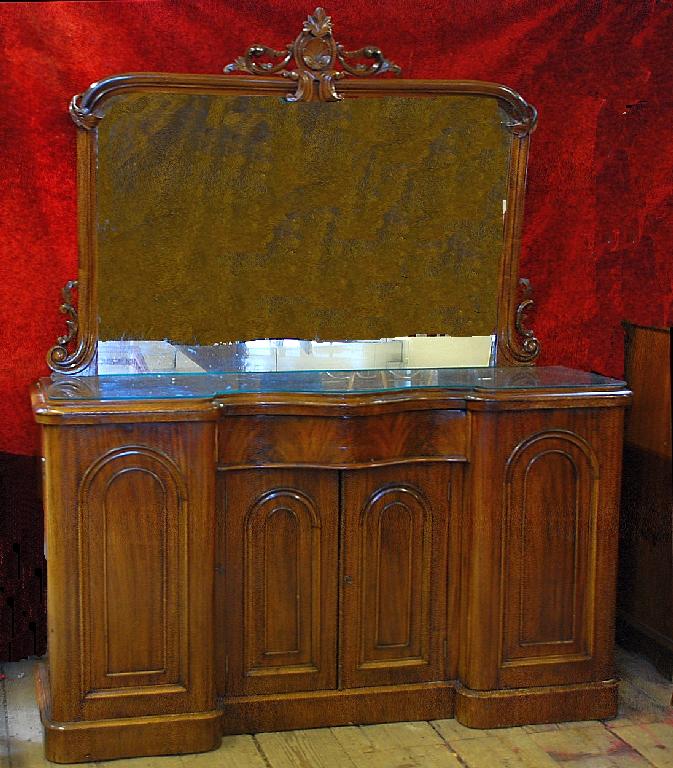 Appraisal: VICTORIAN CARVED MAHOGANY MIRROR BACK SIDEBOARD the matched back with