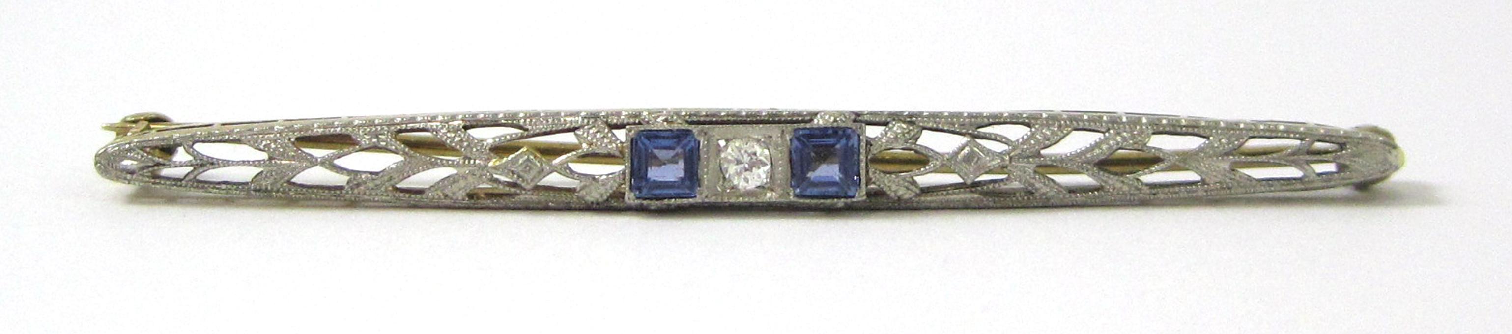 Appraisal: ART DECO SAPPHIRE AND DIAMOND BAR PIN The platinum and