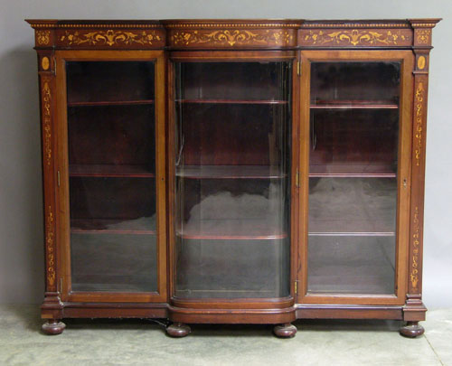 Appraisal: Marquetry inlaid mahogany bookcase h x w