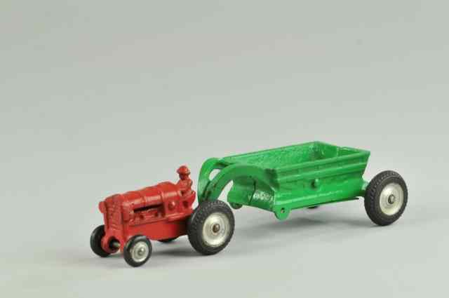 Appraisal: ARCADE FARM TRACTOR AND DUMP WAGON Cast iron red tractor