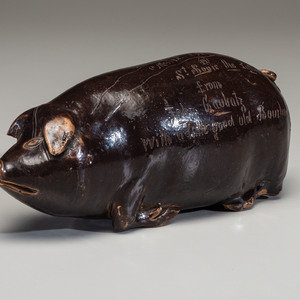 Appraisal: An Anna Pottery Incised and Brown Glazed Pig Flask Anna