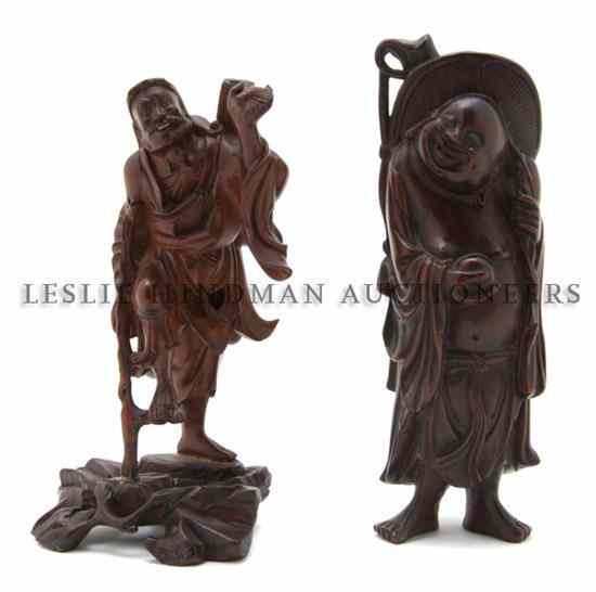 Appraisal: A Group of Two Chinese Wood Carvings the first of