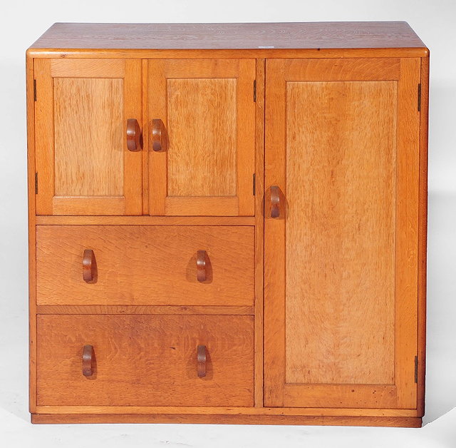 Appraisal: A Heals oak compactumcirca s having cupboard section over two