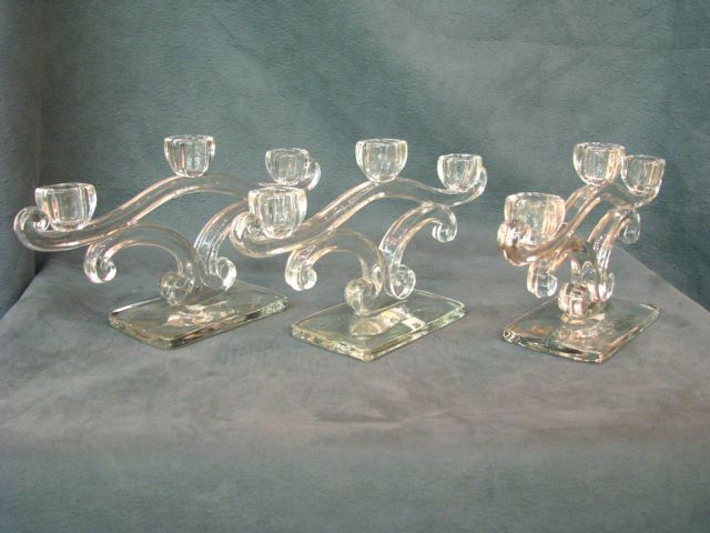 Appraisal: Group of three -branch pattern glass candlesticks Art Deco style