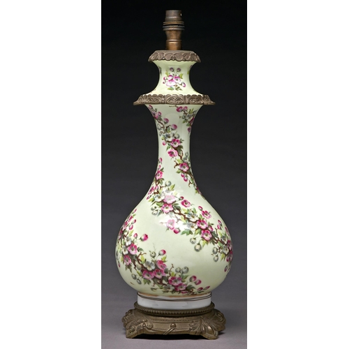 Appraisal: A French gilt lacquered brass mounted porcelain oil lamp c