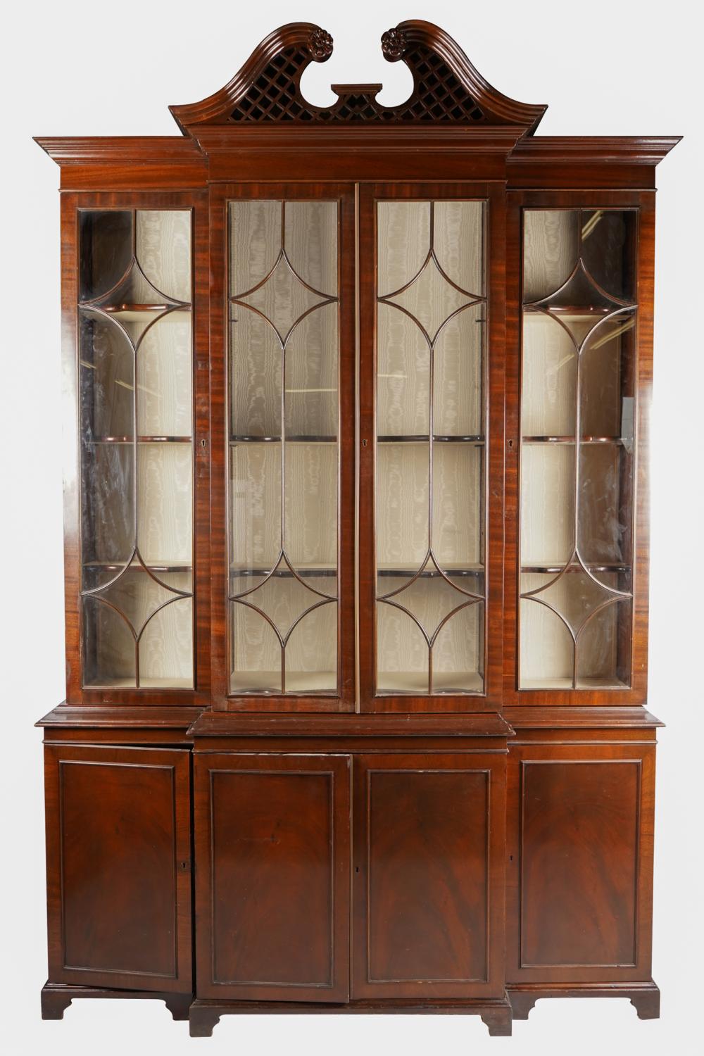 Appraisal: CHIPPENDALE STYLE MAHOGANY BREAKFRONT CABINETin two sections the upper section