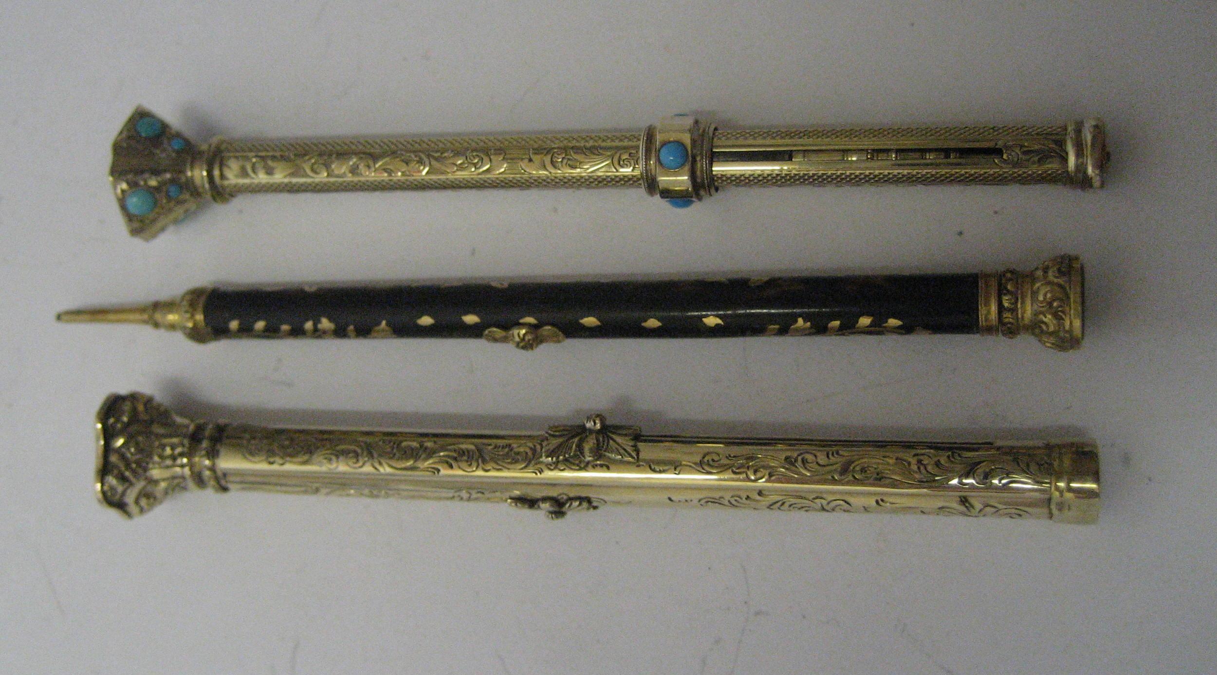 Appraisal: THREE VICTORIAN PENS PENCILS comprising a slim tortoiseshell pencil with