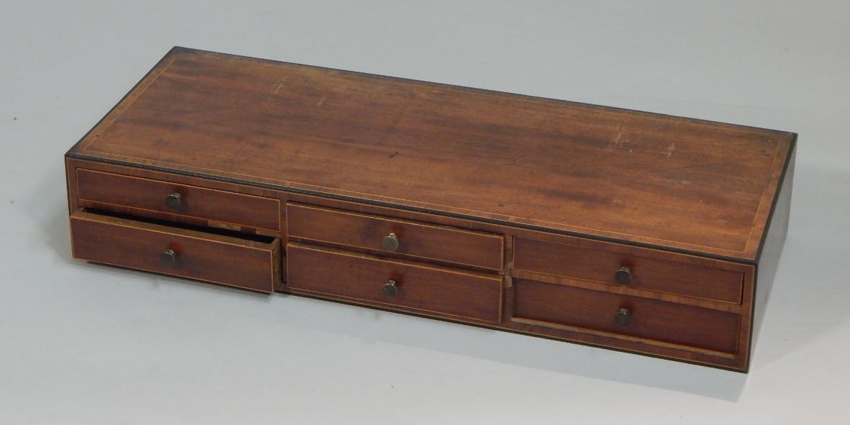 Appraisal: A small group of six collectors drawers the rectangular top