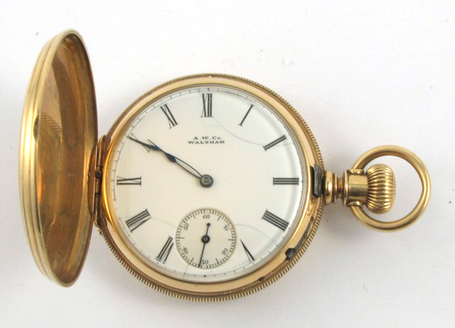 Appraisal: FOURTEEN KARAT GOLD HUNTING CASE POCKET WATCH American Waltham Watch