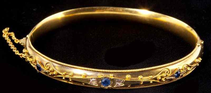 Appraisal: Antique Gold Diamond and Sapphire Bangle BraceletEnglish early th century