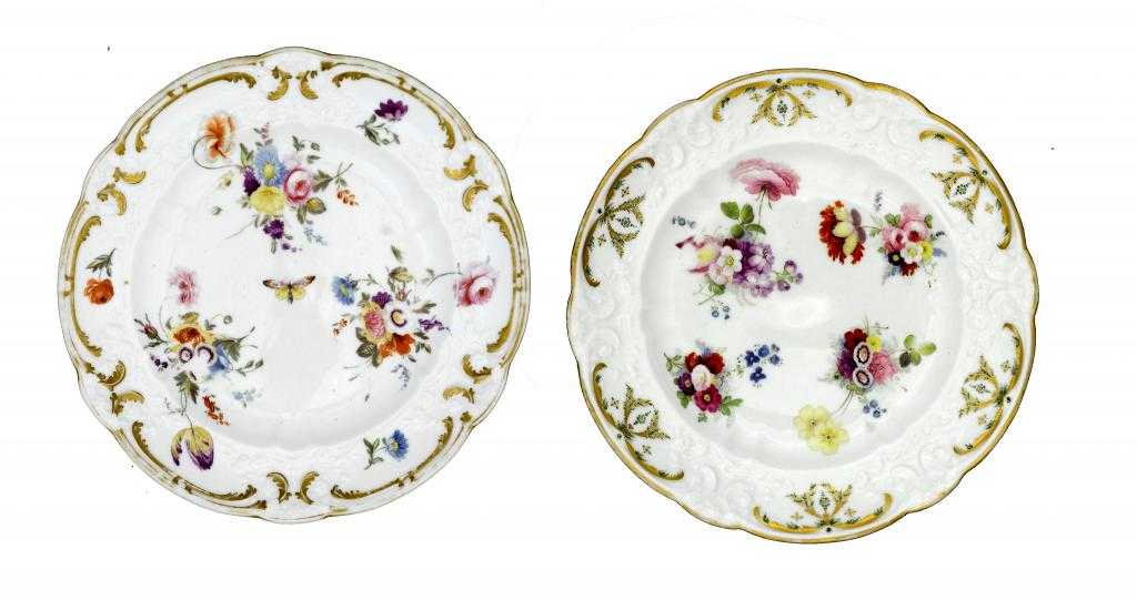 Appraisal: TWO SWANSEA DESSERT PLATES with C scroll moulding one painted