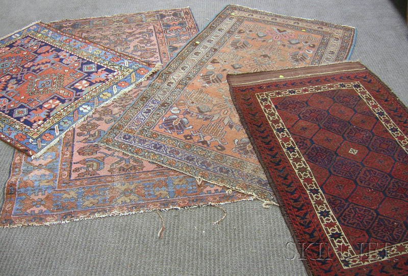 Appraisal: Four Persian Rugs th century two Hamadan ft x ft