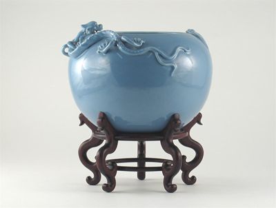 Appraisal: A Chinese lavender-glazed bowl the rim applied with a dragon