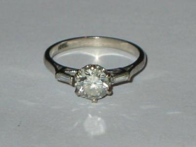 Appraisal: A SOLITAIRE DIAMOND RING the brilliant cut stone approximately cts