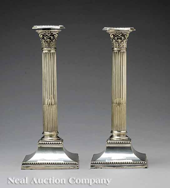 Appraisal: A Handsome Pair of Silverplate Corinthian Column Candlesticks stop-fluted columns